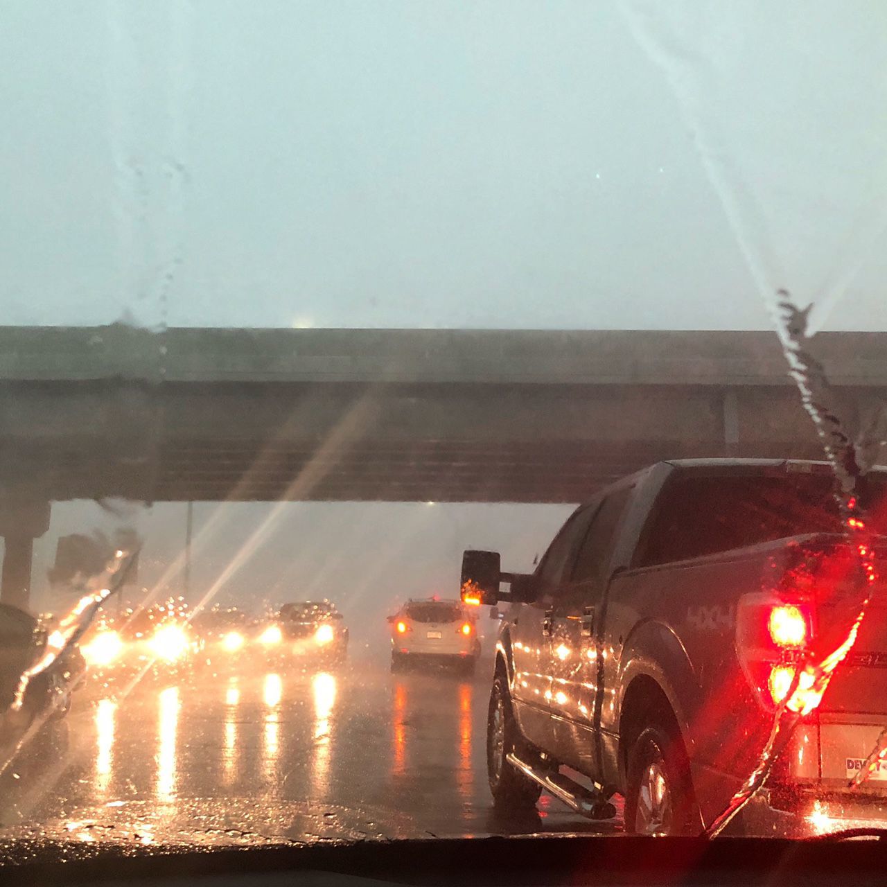 Cars under overpass